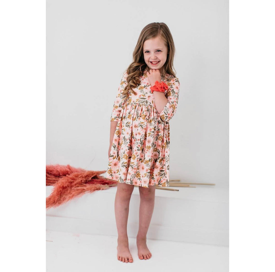 PRETTY PEACHY TWIRL DRESS